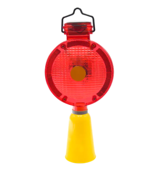 Plug-in solar warning light with red lens housing and yellow cone base